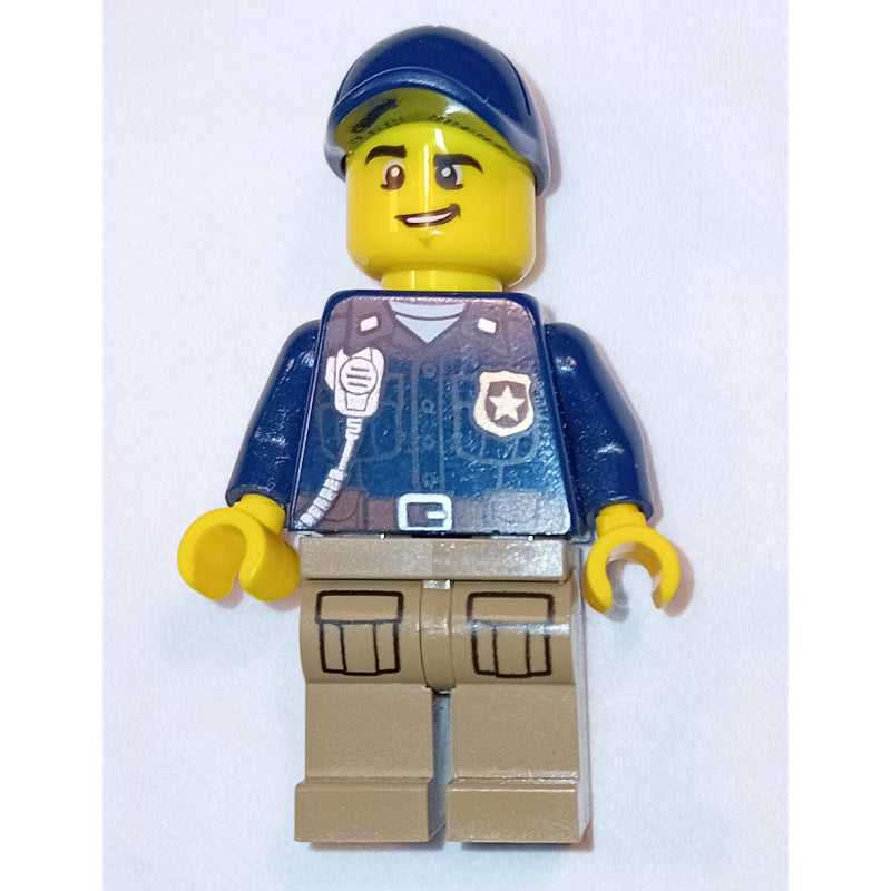 fig-007919 – Policeman, Dark Blue Shirt with Radio and Badge, Dark Tan Legs, Dark Blue Cap