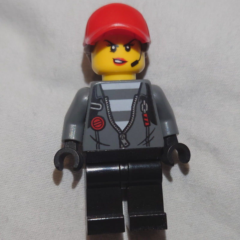 fig-007948 – Criminal, Woman, Open Dark Bluish Gray Jacket with Zipper over Prison Shirt, Red Cap with Hair