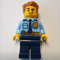 fig-007953 – Policeman, Bright Light Blue Shirt with Dark Blue Tie, Badge, and Radio on Belt, Medium Nougat Hair