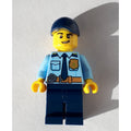 fig-007956 – Policeman, Bright Light Blue Shirt with Dark Blue Tie, Badge, and Radio on Belt, Dark Blue Cap, Open Mouth