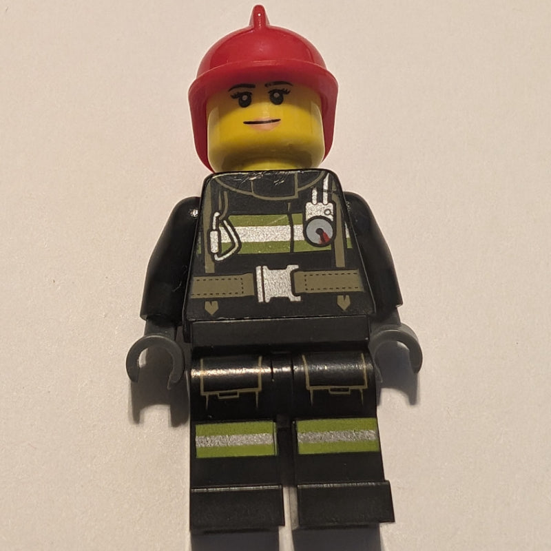 fig-008083 – Firewoman, Black Fire Suit with Gauge and Straps, Red Helmet