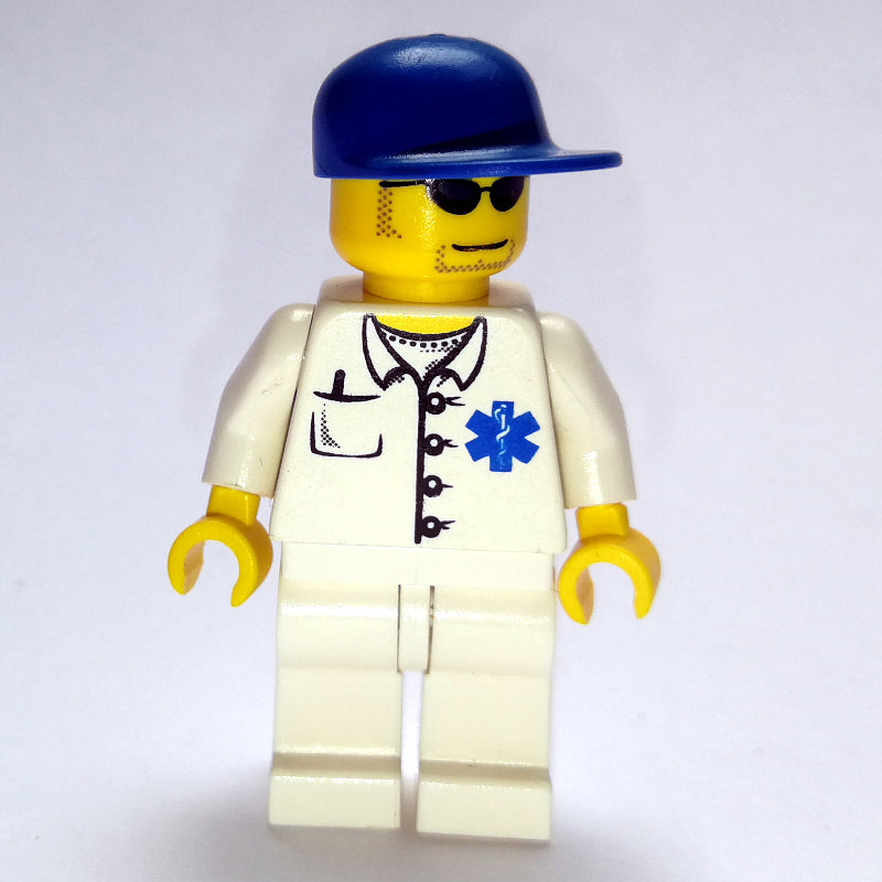 fig-008174 – Doctor, White Shirt with Star of Life Logo, Blue Cap, Sunglasses