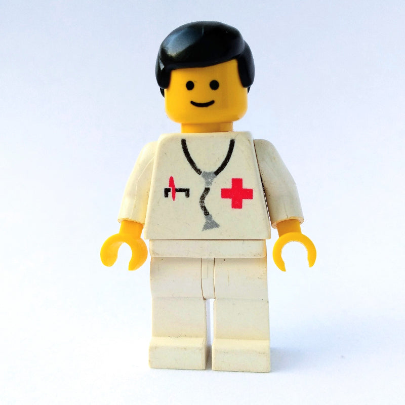 fig-008212 – Doctor, White Torso with Stethoscope and Red Cross, White Legs, Black Hair