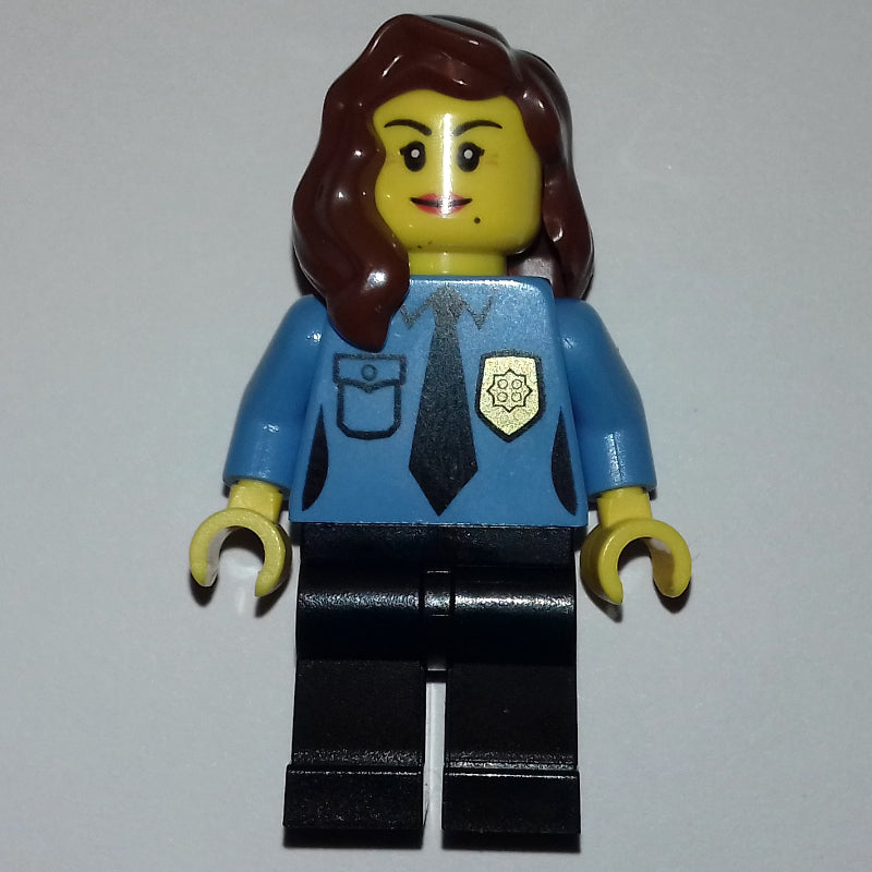 fig-008227 – Policewoman, Medium Blue Shirt with Tie and Badge, Black Legs, Reddish Brown Hair