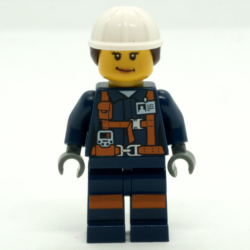 fig-008284 – Miner, Woman, Dark Blue Jacket with Straps and ID Badge, White Hard Hat with Hair