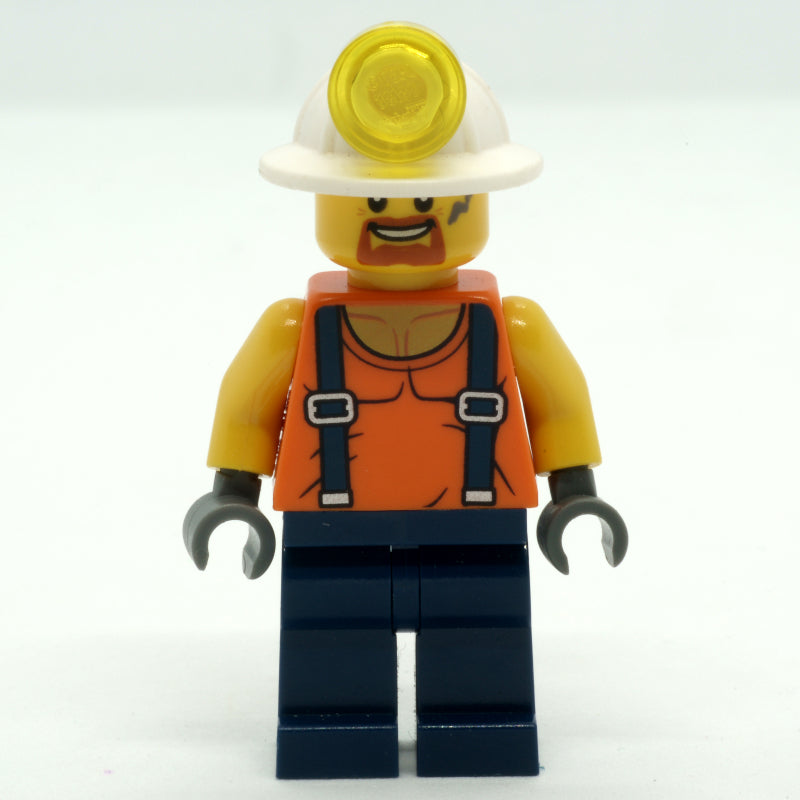 fig-008287 – Miner, Orange Vest with Suspenders, Mining Hat, Goatee Beard and Dirty