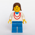 fig-008491 – Woman, White Top with Red Necklace, Blue Legs, Brown Hair