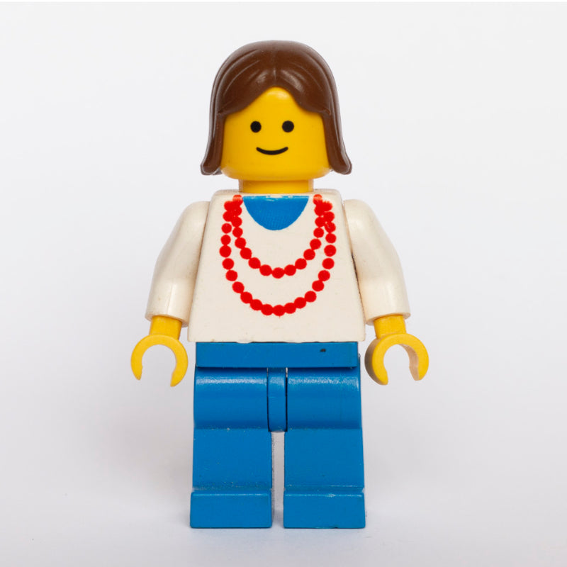 fig-008491 – Woman, White Top with Red Necklace, Blue Legs, Brown Hair