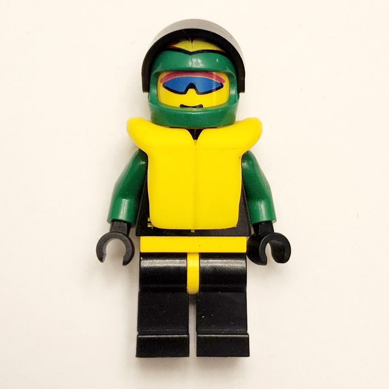 fig-008544 – Racer, Extreme Team, Black Jacket, Black Legs, Green Helmet with Visor, Yellow Life Vest, Blue Sunglasses