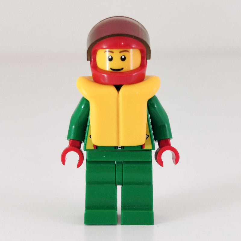 fig-008572 – Racer, Green Jacket with Zipper and Octan Logo, Red Helmet with Visor, Yellow Life Vest