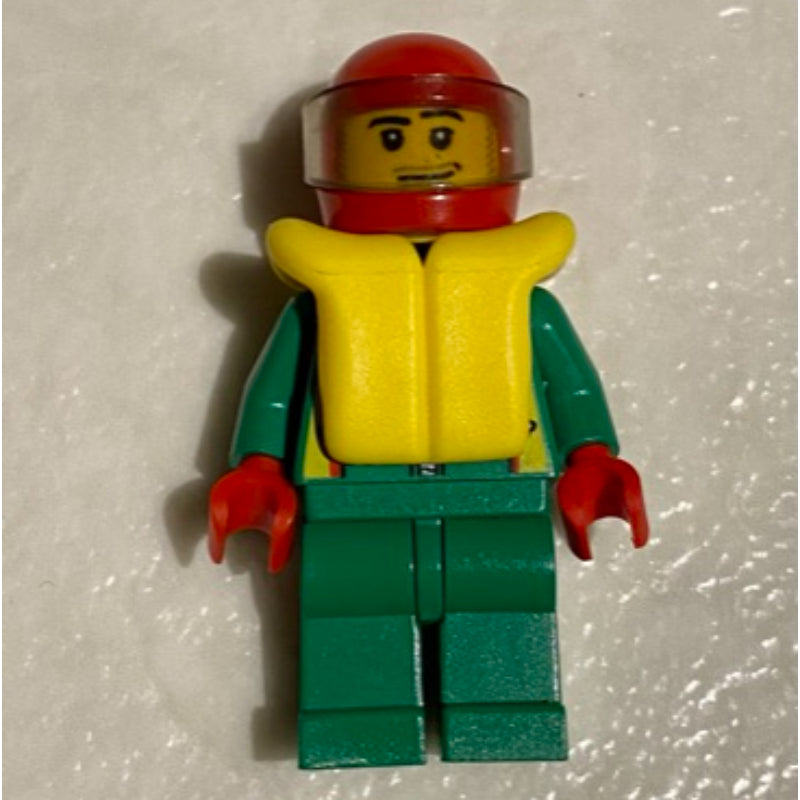 fig-008573 – Racer, Green Jacket with Zipper and Octan Logo, Red Helmet with Visor, Yellow Life Vest, Stubble