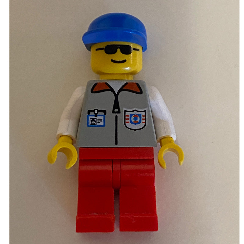 fig-008591 – Coast Guard, Light Gray Jacket with Zipper and Badge, Blue Cap, Sunglasses