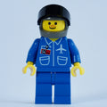 fig-008647 – Pilot, Blue Jacket with Plane Logo and ID Badge, Dark Gray Helmet with Visor