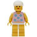 fig-008710 – Woman, Tied Pink Tank Top with Flowers, Yellow Legs, White Cap