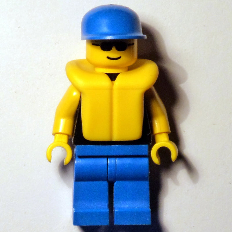 fig-008826 – Man, Black Torso, Blue Legs, Blue Cap, Yellow Life Vest