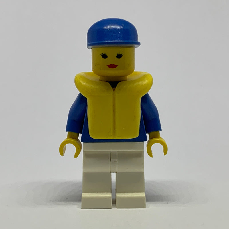 fig-008830 – Woman, Blue and White Jogging Suit, Blue Cap, Yellow Life Vest