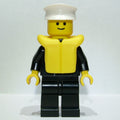 fig-008840 – Boat Admiral, Black Suit with Gold Anchor, Yellow Life Vest