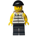 fig-008863 – Criminal, Torn Prison Shirt, Black Legs, Black Hat, Dark Tan Backpack, Stubble and Scar