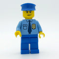 fig-008865 – Policeman, Medium Blue Shirt with Badge and Tie, Blue Legs, Blue Hat, Scowl