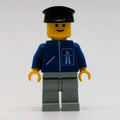 fig-008886 – Man, Blue Jacket with Highway Logo, Light Gray Legs, Black Hat