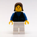 fig-008896 – Woman, Black Vest over Blue Top, White Legs, Brown Hair