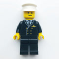 fig-008985 – Pilot, Black Suit with Tie and Airplane Badge, White Hat