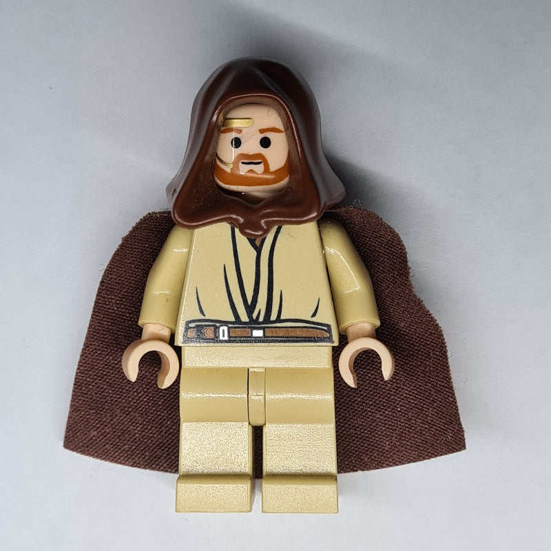 fig-009119 – Obi-Wan Kenobi, Tan Legs, Headset, Reddish Brown Hood and Cape