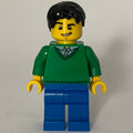 fig-009283 – Man, Green V-Neck Sweater, Blue Legs, Black Hair