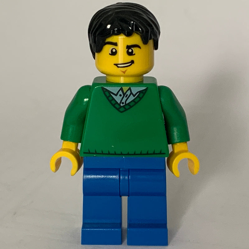 fig-009283 – Man, Green V-Neck Sweater, Blue Legs, Black Hair