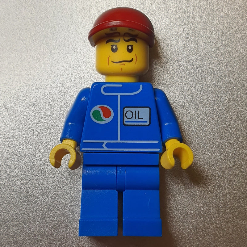fig-009295 – Man, Blue Jumpsuit with Octan Logo, Dark Red Cap