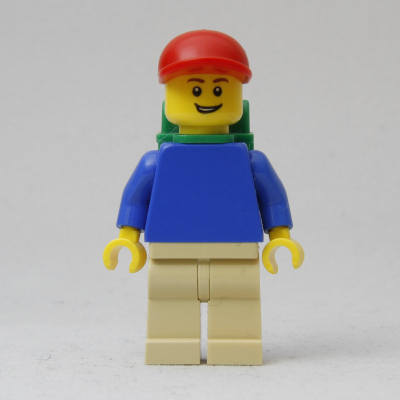fig-009315 – Blue Torso, Tan Legs, Red Cap, Green Backpack
