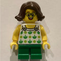 fig-009348 – Kid - White Torso, Green Legs, Dark Brown Hair