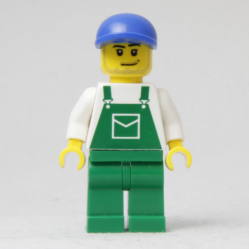 fig-009419 – Man, Green Overalls, Blue Cap, Stubble (4485 Cap)