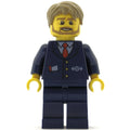 fig-009425 – Bus Driver, Dark Blue Suit with Train Logo, Dark Tan Hair, Beard