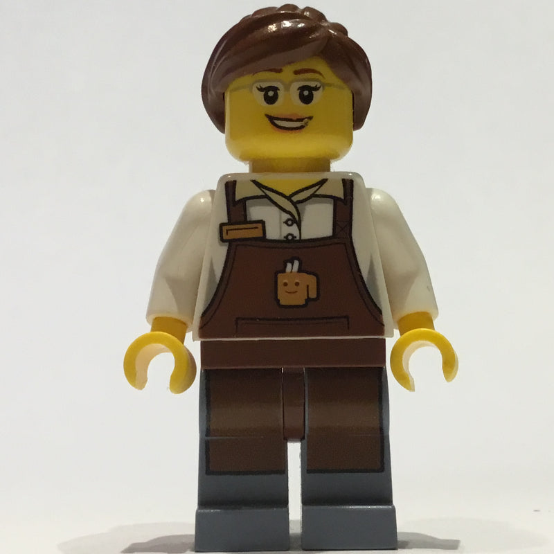 fig-009435 – Barista, Woman, White Torso, Reddish Brown Apron, Reddish Brown Hair, Glasses
