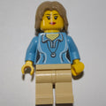fig-009553 – Woman, Medium Blue Polo Shirt with Necklace, Tan Legs, Dark Tan Hair