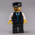 fig-009564 – Man, Black Vest and Tie, Black Legs, Black Hat, Beard and Glasses