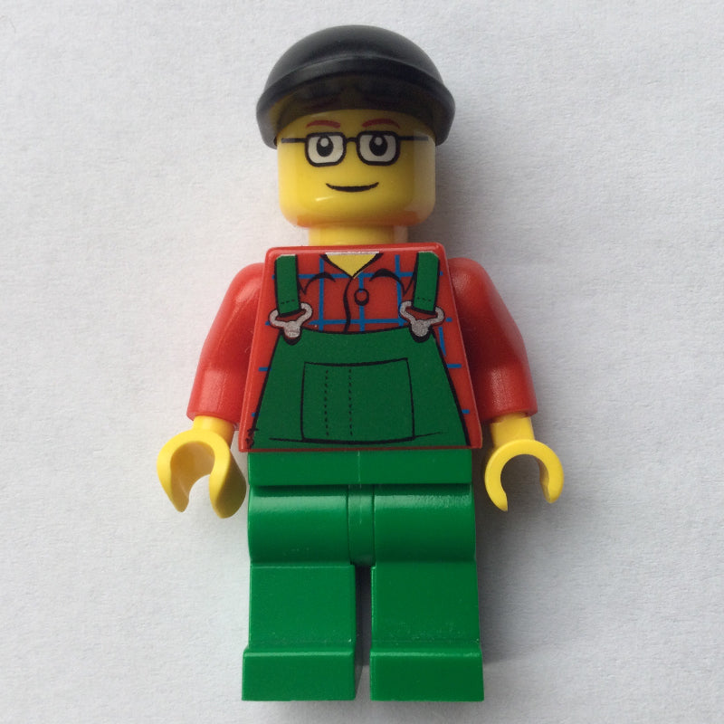 fig-009599 – Man, Green Overalls over Red Shirt, Black Cap, Glasses