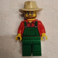 fig-009615 – Man, Green Overalls over Red Shirt, Tan Wide Brim Hat, Beard and Glasses