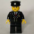 fig-009624 – Pilot, Black Suit with Tie and Airplane Badge, Black Hat, Brown Eyebrows