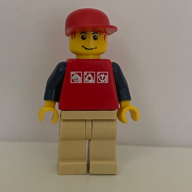 fig-009651 – Man, Red Top with Dark Blue Arms, Tan Legs, Red Cap