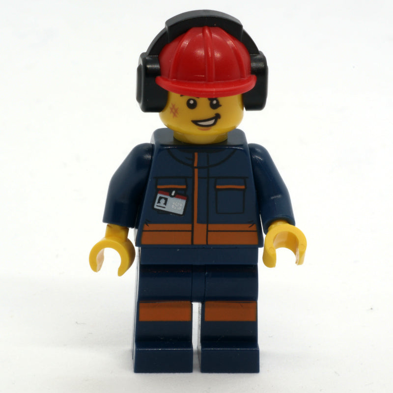 fig-009653 – Ground Crew, Dark Blue Jumpsuit, Red Hard Hat with Ear Defenders