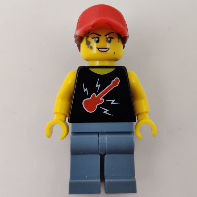 fig-009704 – Woman, Black Top with Guitar, Sand Blue Legs, Red Cap with Hair