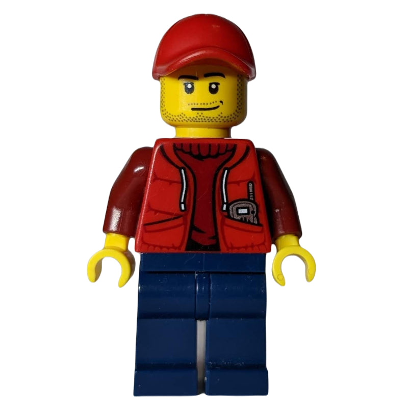 fig-009747 – Marine Explorer, Open Red Jacket over Dark Red Sweater, Red Cap, Stubble