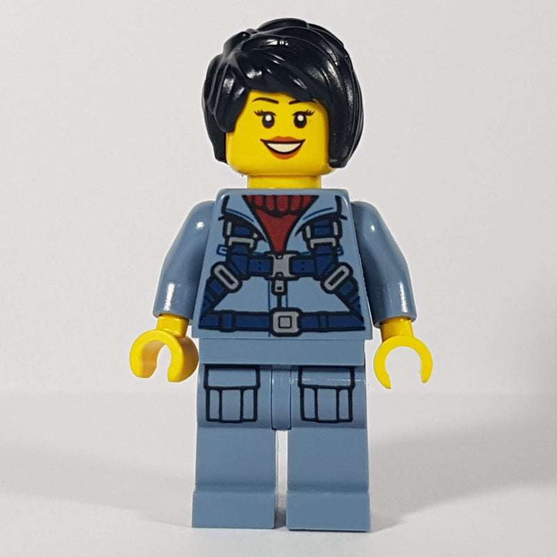 fig-009765 – Marine Explorer, Woman, Sand Blue Jumpsuit, Black Hair