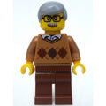 fig-009787 – Man, Medium Nougat Argyle Sweater, Reddish Brown Legs, Moustache and Glasses