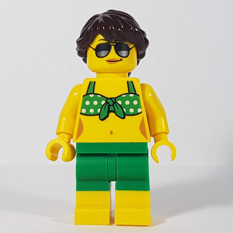 fig-009819 – Woman, Green Bikini Top with White Spots, Green Shorts, Dark Brown Hair, Sunglasses
