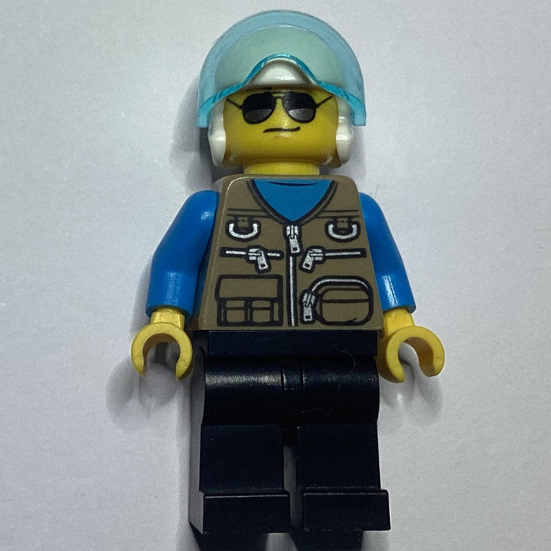 fig-009828 – Pilot, Dark Tan Vest with Zippers and Pouches, Black Legs, White Helmet with Visor, Sunglasses