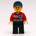 fig-009830 – Paramedic, Woman, Red Jacket with Star of Life, Dark Blue Cap with Hair