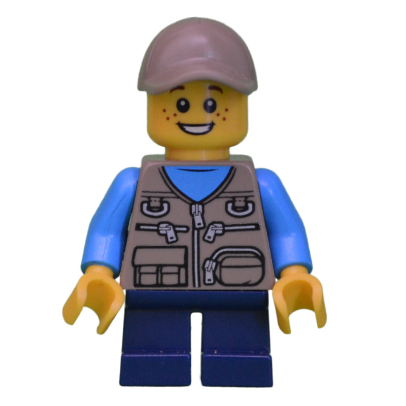 fig-009836 – Boy, Dark Tan Vest with Zippers and Pouches, Short Dark Blue Legs, Dark Tan Cap